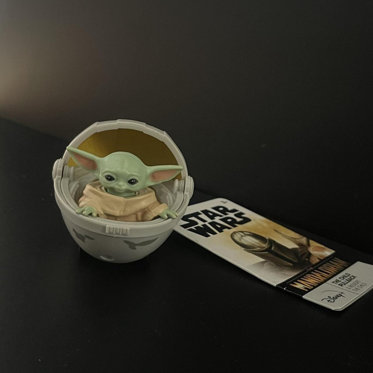 baby yoda in a car - moves when you pull wheels... - Depop