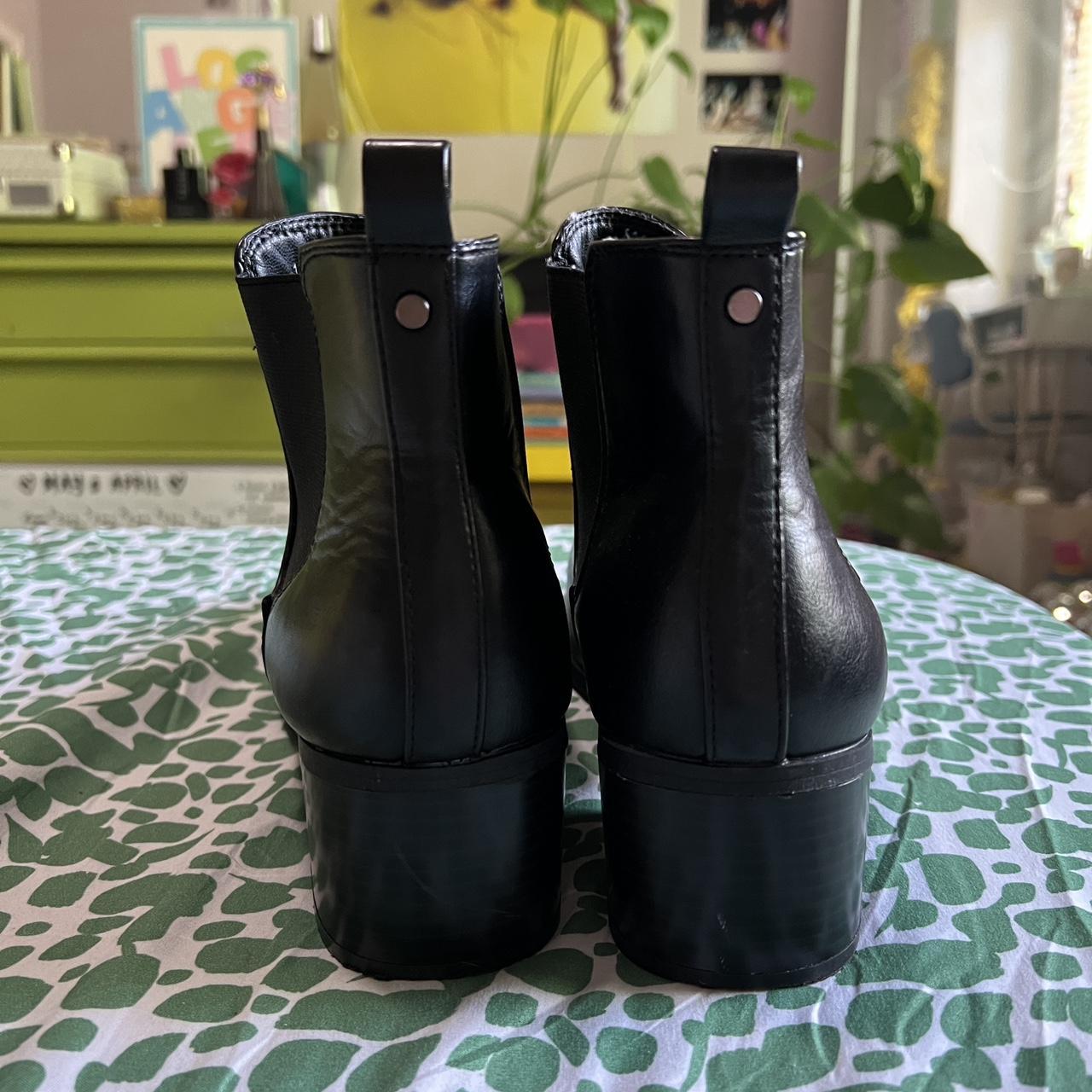 faux leather target heeled boots. relatively... Depop
