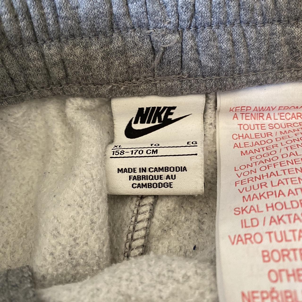 Grey Nike joggers xl youth - Depop