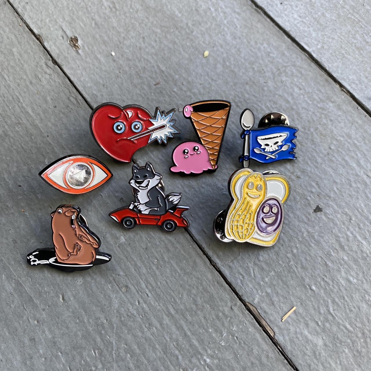 Lot of loot crate pins, hardly used, if want to buy... Depop