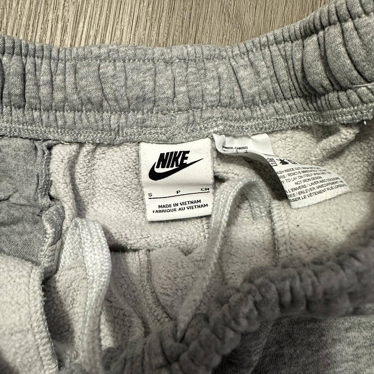 grey nike basketball shorts, they are really comfy.... Depop