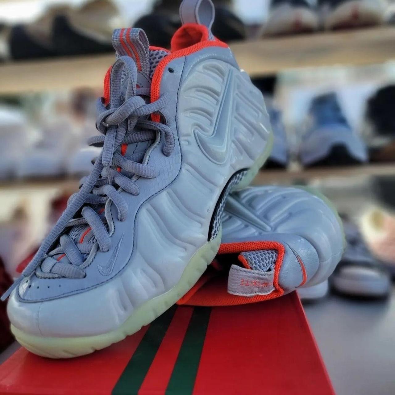 white and orange foamposites