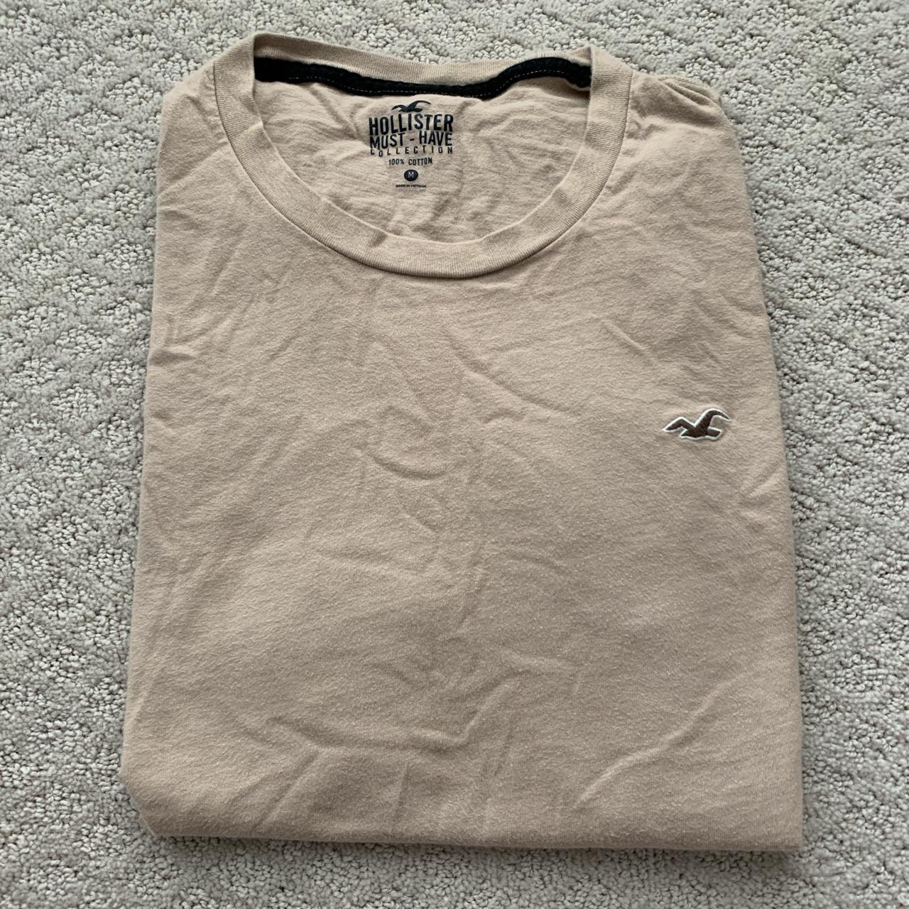 Tan Tee shirt. Very comfortable lightweight material... - Depop