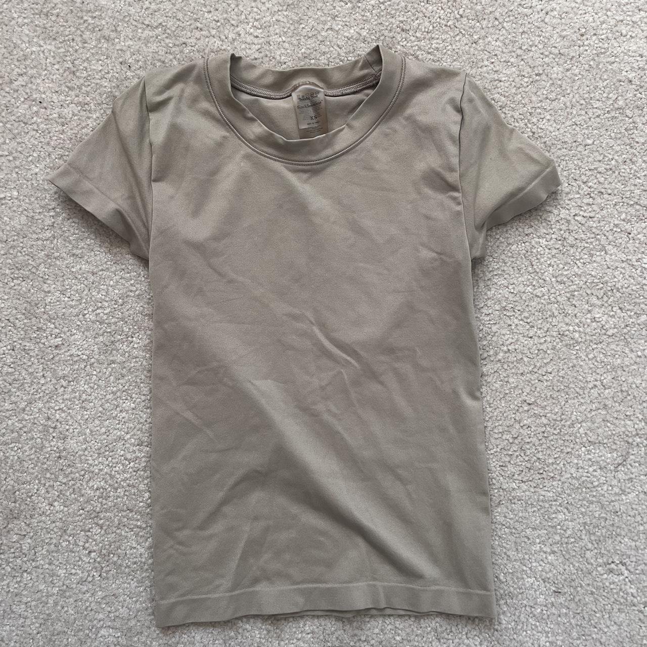 Aritzia Taupe Seamless T Shirt Skims material Size... - Depop