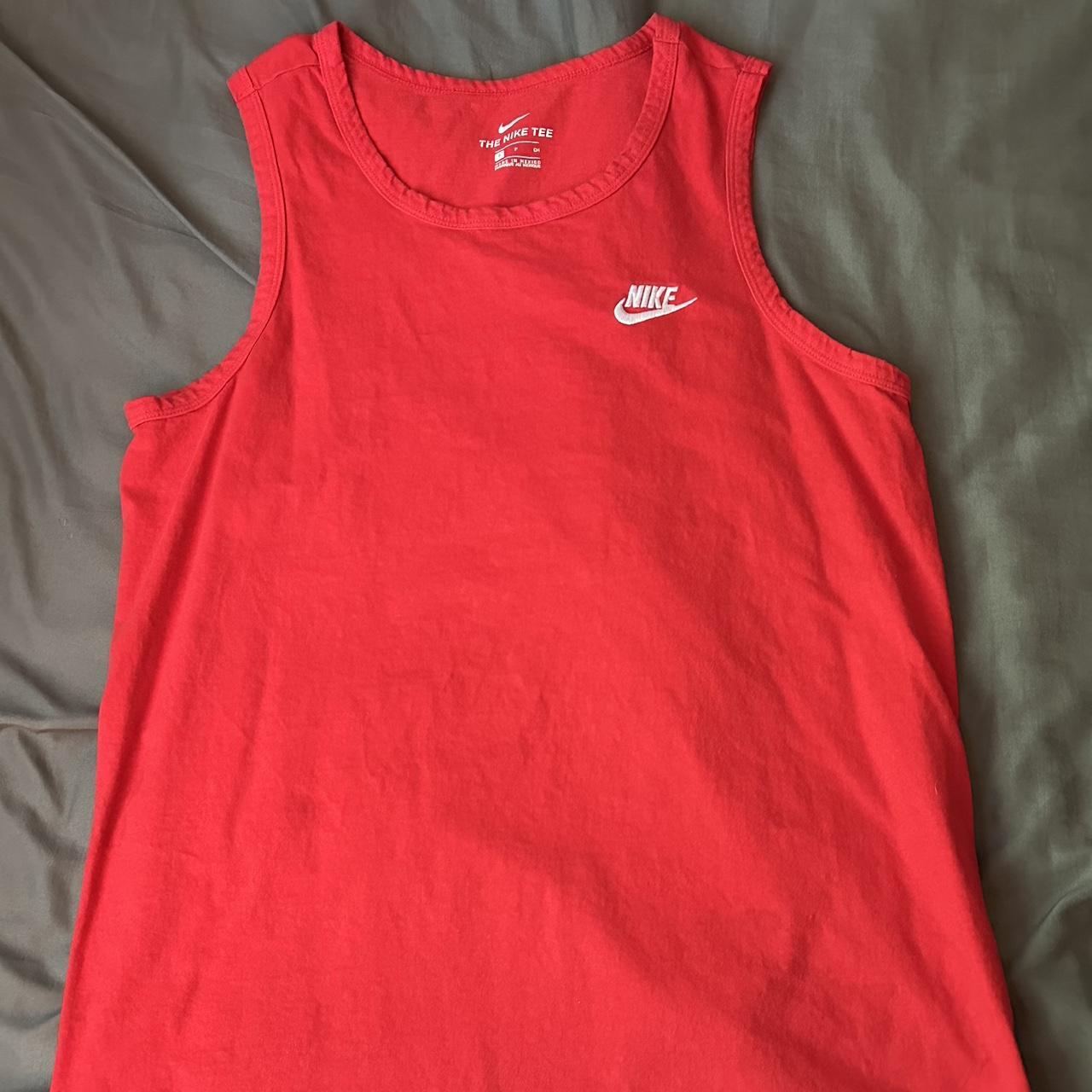 Red Nike wife beater size men’s small, fits baggy - Depop