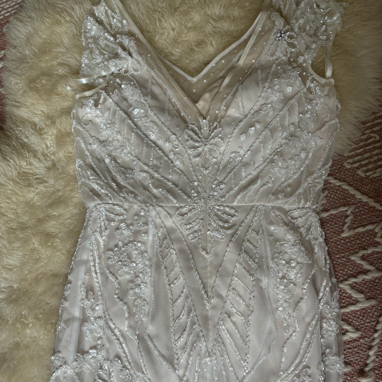 Bhldn aurora creme gown by Etoile embellished full. Depop