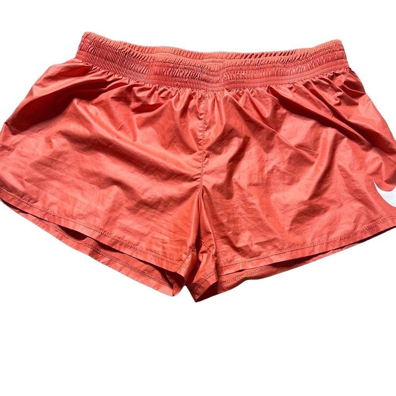 Orange nike clearance shorts womens