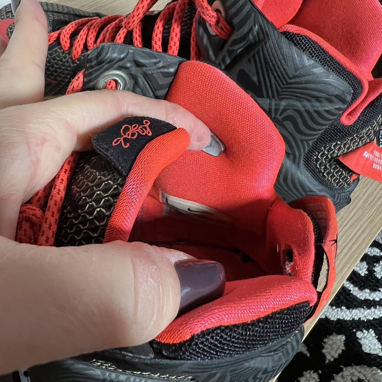 LeBron James black and orange Nike high tops - Depop