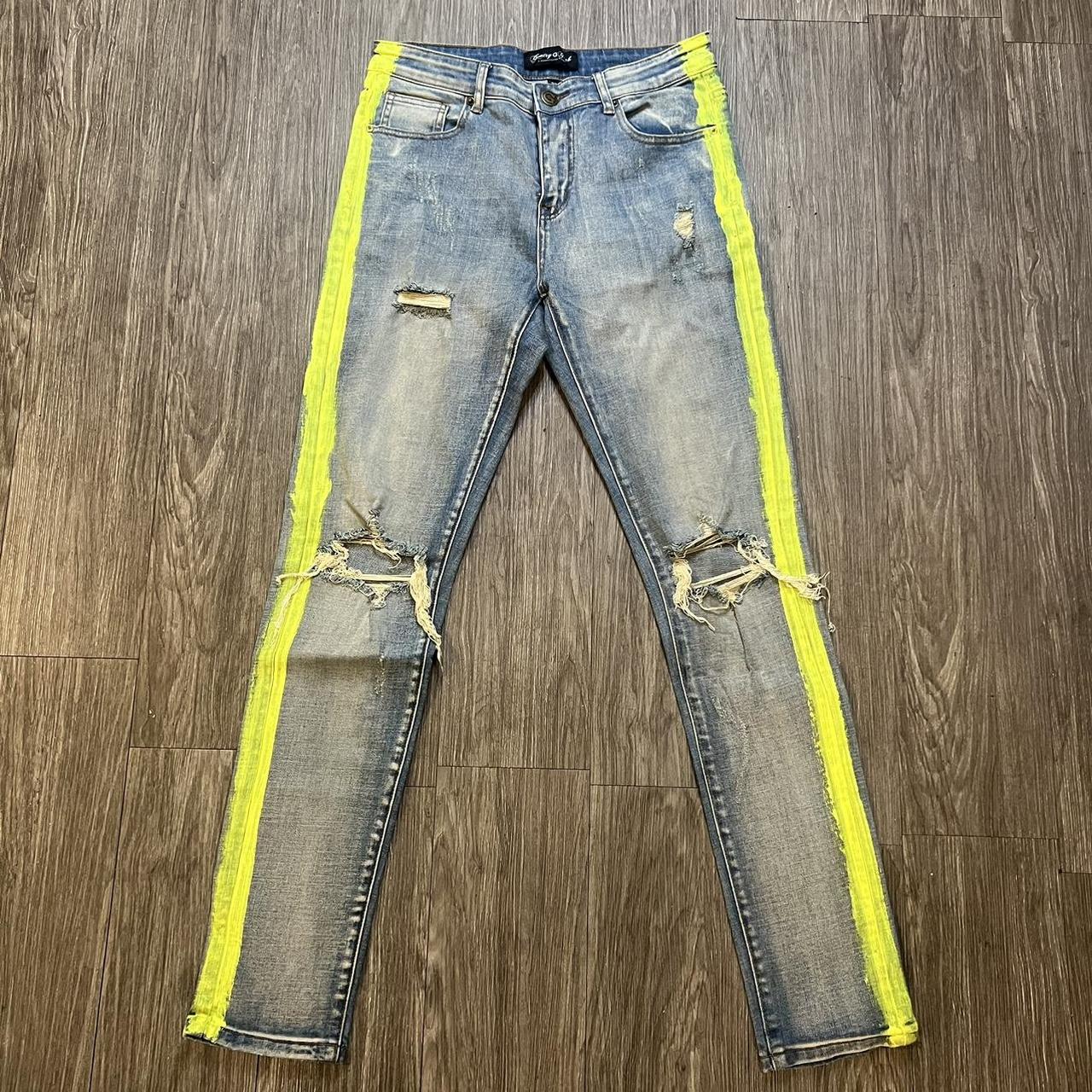 Ripped Blue jeans with yellow stripe. Adjustable