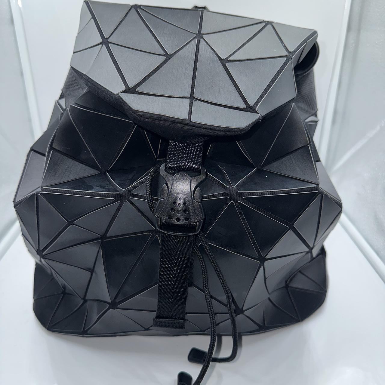 Black geometric backpack hotsell