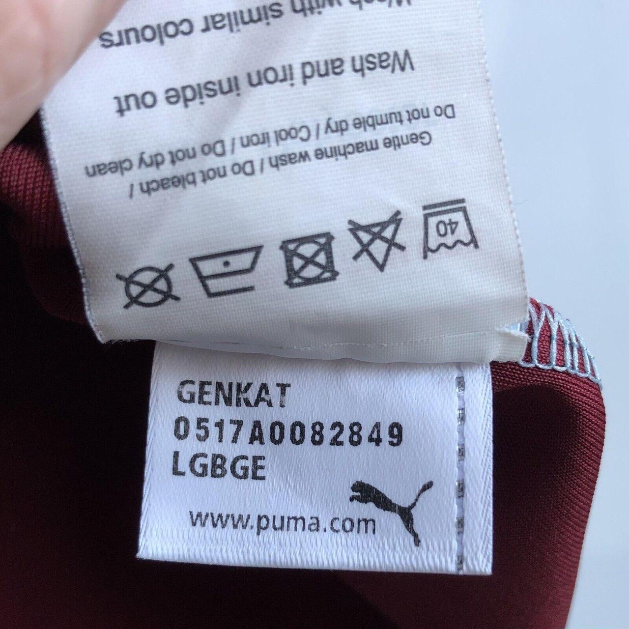 Burgundy pumas in the washing clearance machine