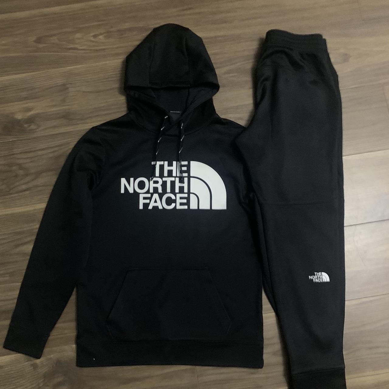 Black and white north face tracksuit, way too small... - Depop