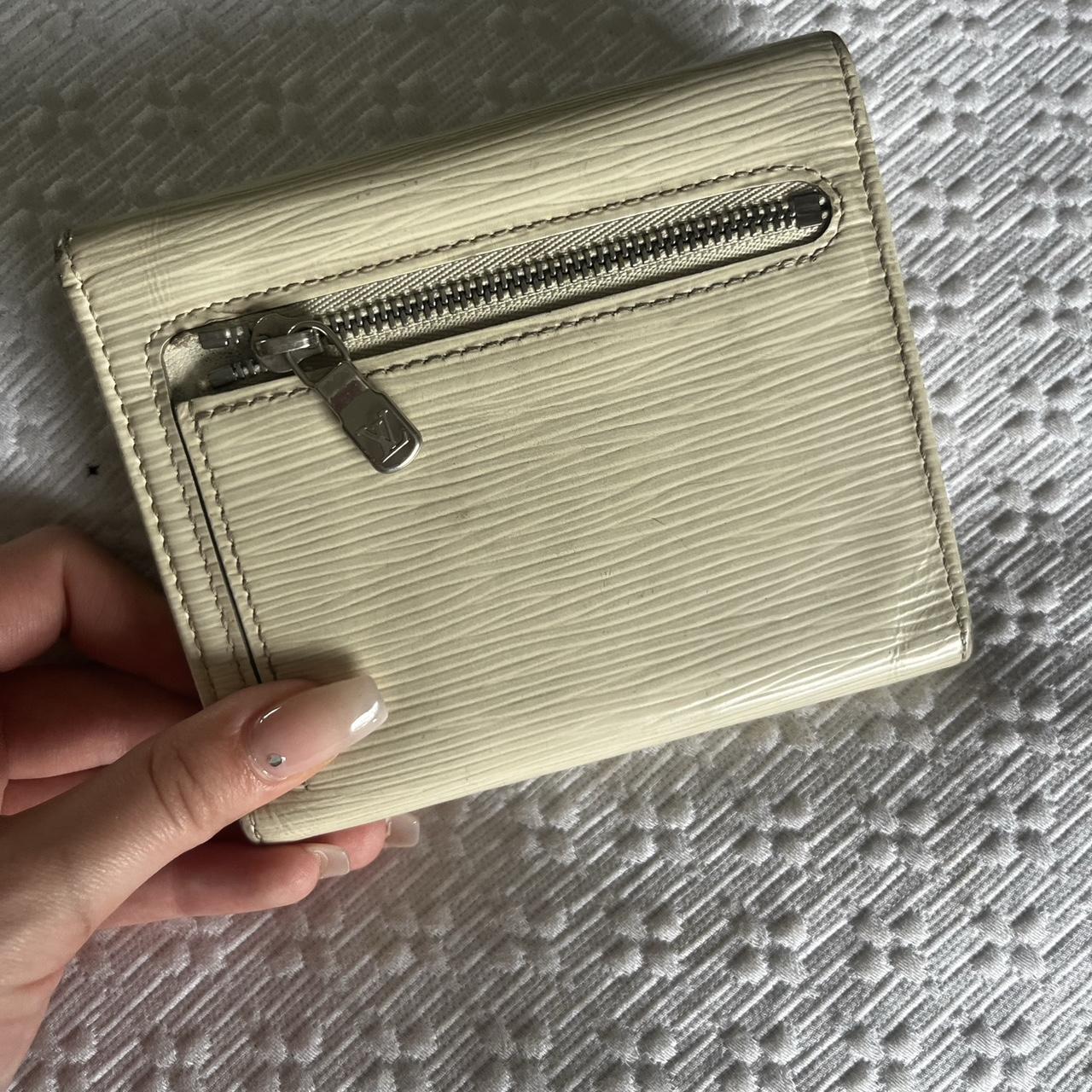 Vintage Louis Vuitton wallet. Front flap has curling - Depop