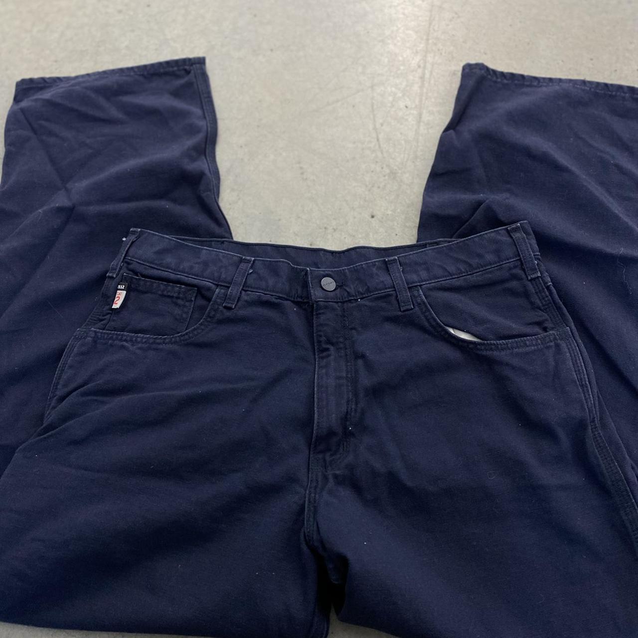 Carhartt FR Pants in navy colorway with patch on the... - Depop