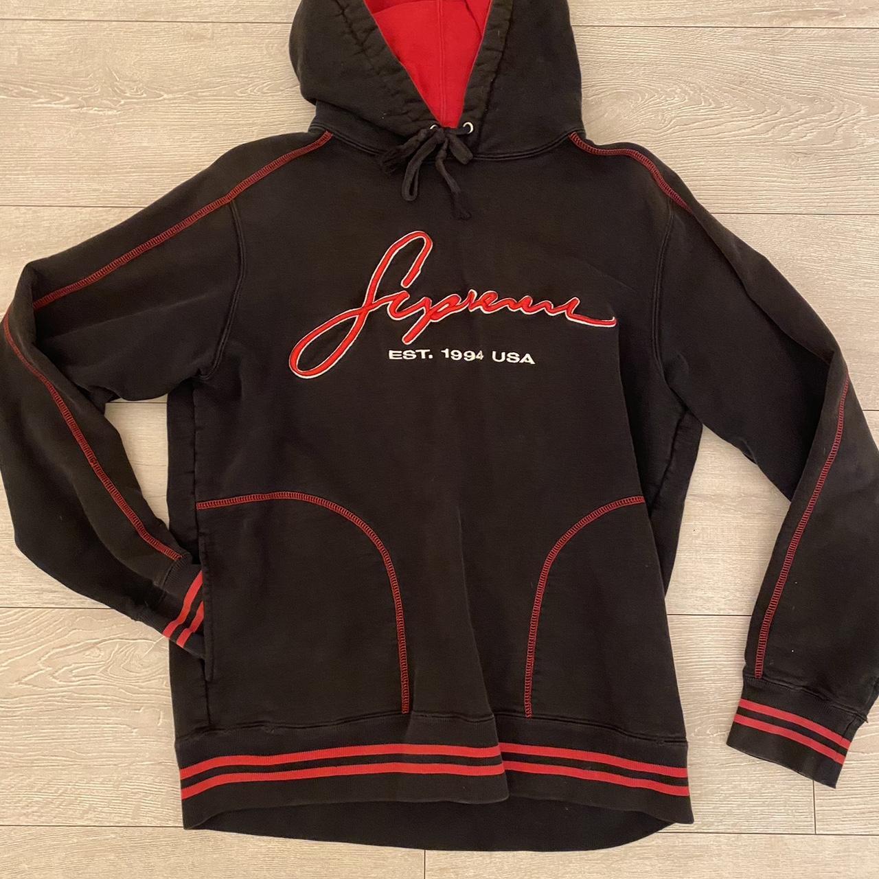 Red and black supreme hoodie on sale