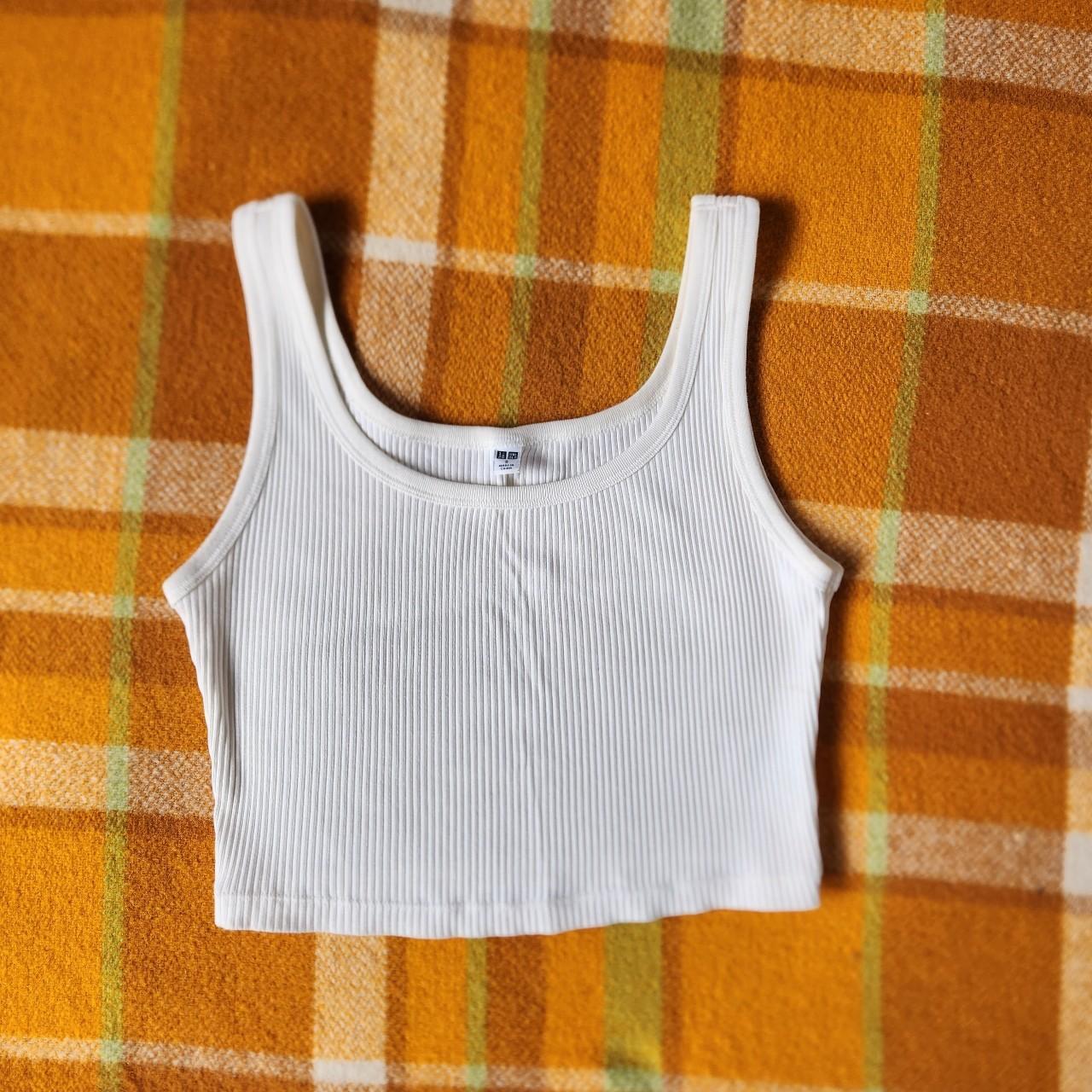 Uniqlo off white cropped tank top. A great basic to... - Depop