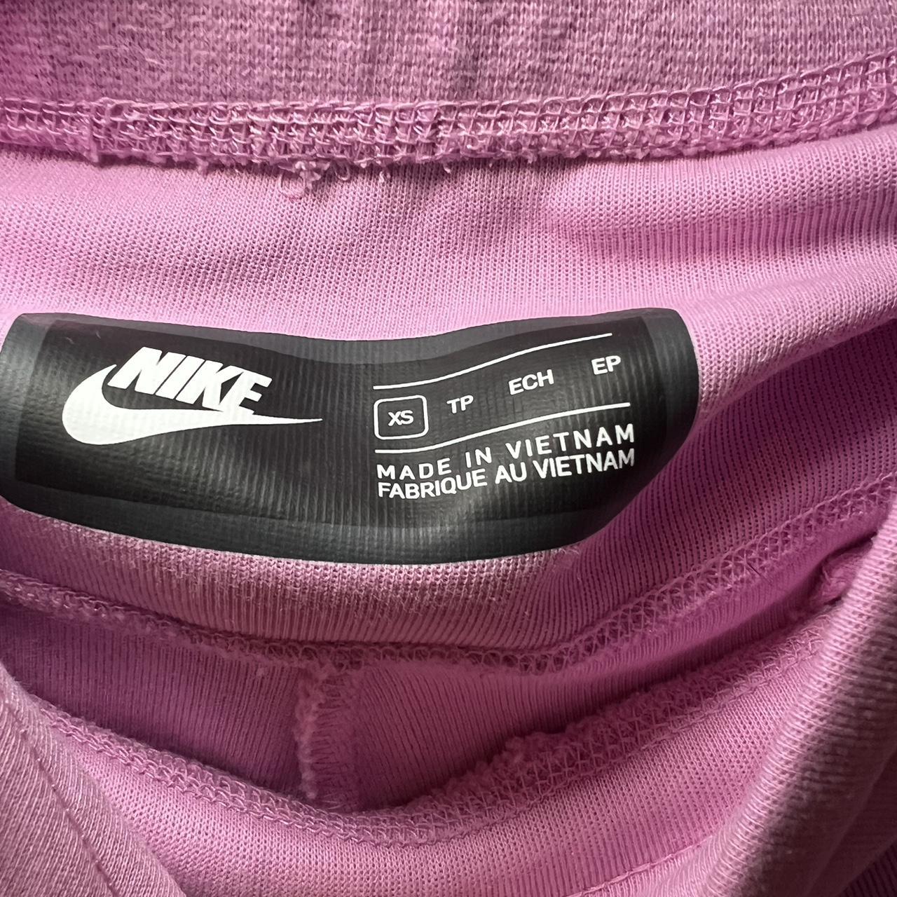 womens pink nike tech tracksuit