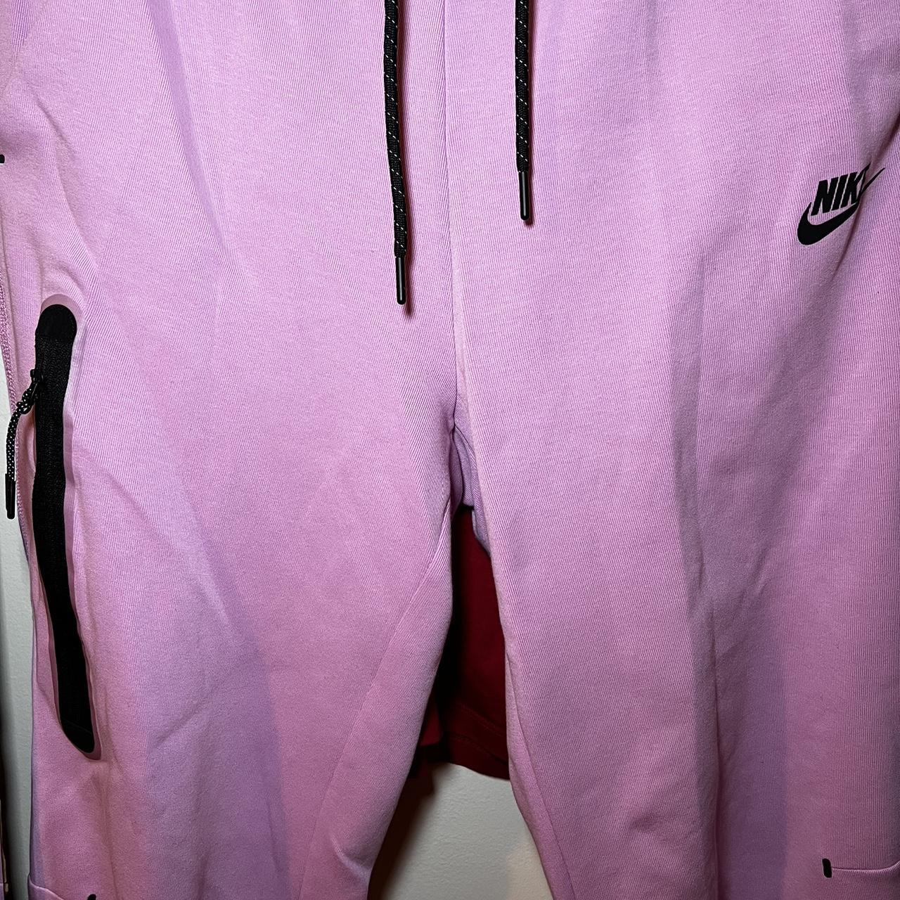 womens pink nike tech tracksuit