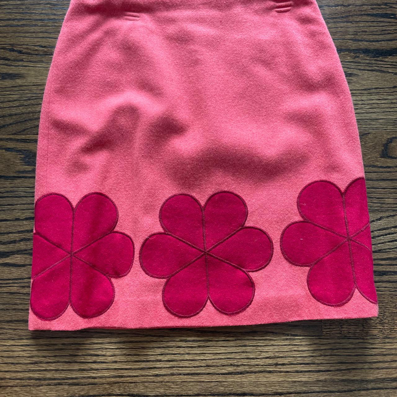 Pink skirt outlet with red flowers