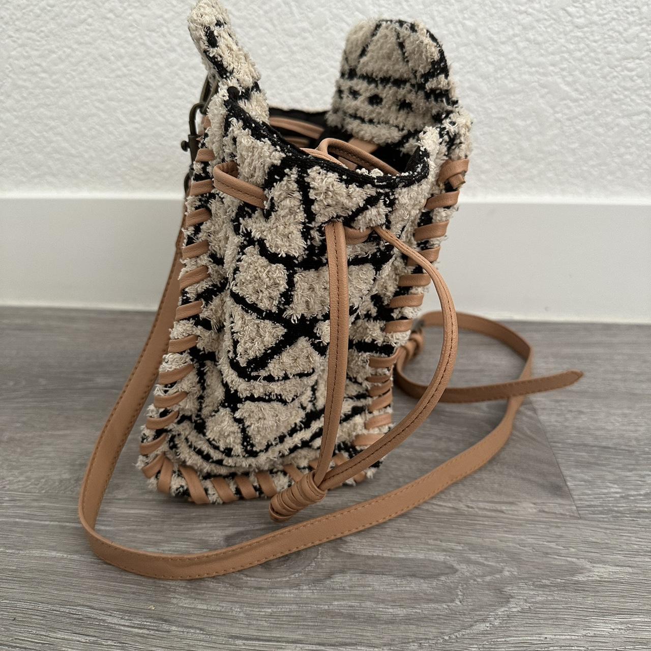 Sherpa boho purse. Long strap that is adjustable.... Depop