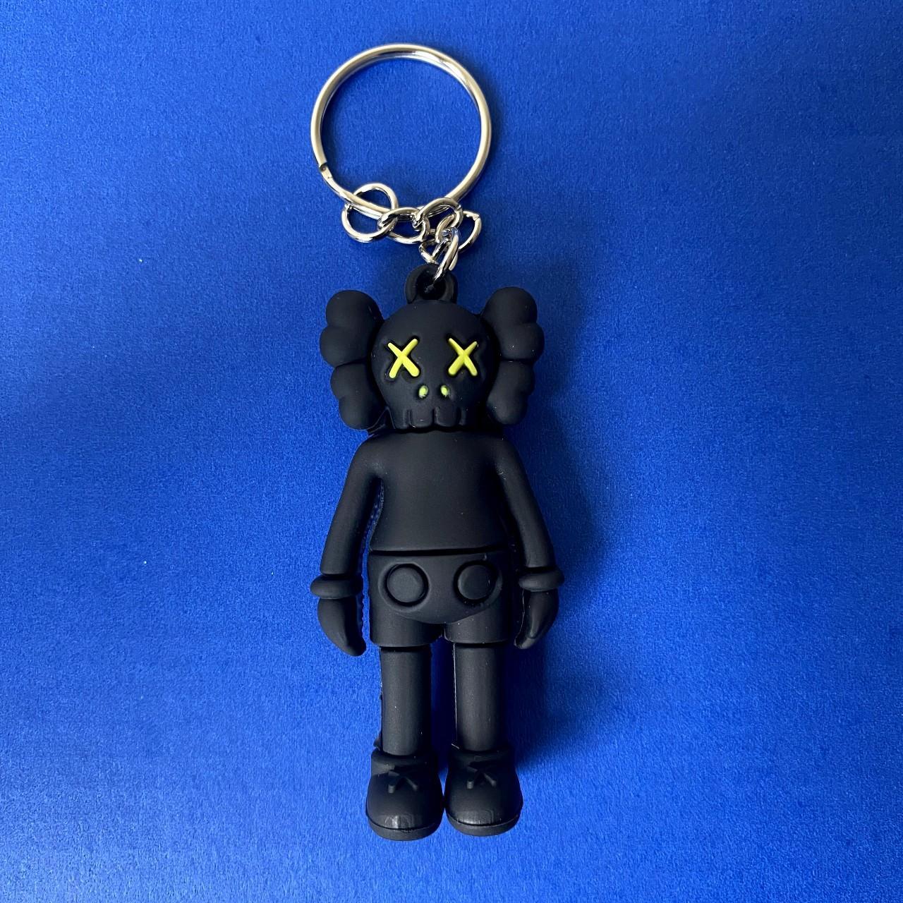 KAWS mini figure keychain black colorway Popular - Depop