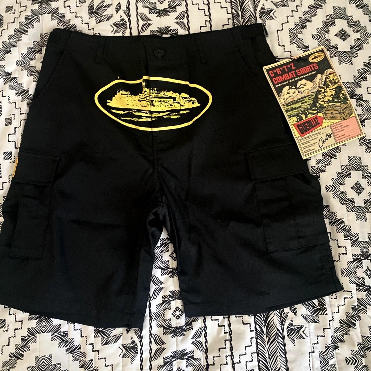 Corteiz cargo shorts yellow and black - size... - Depop