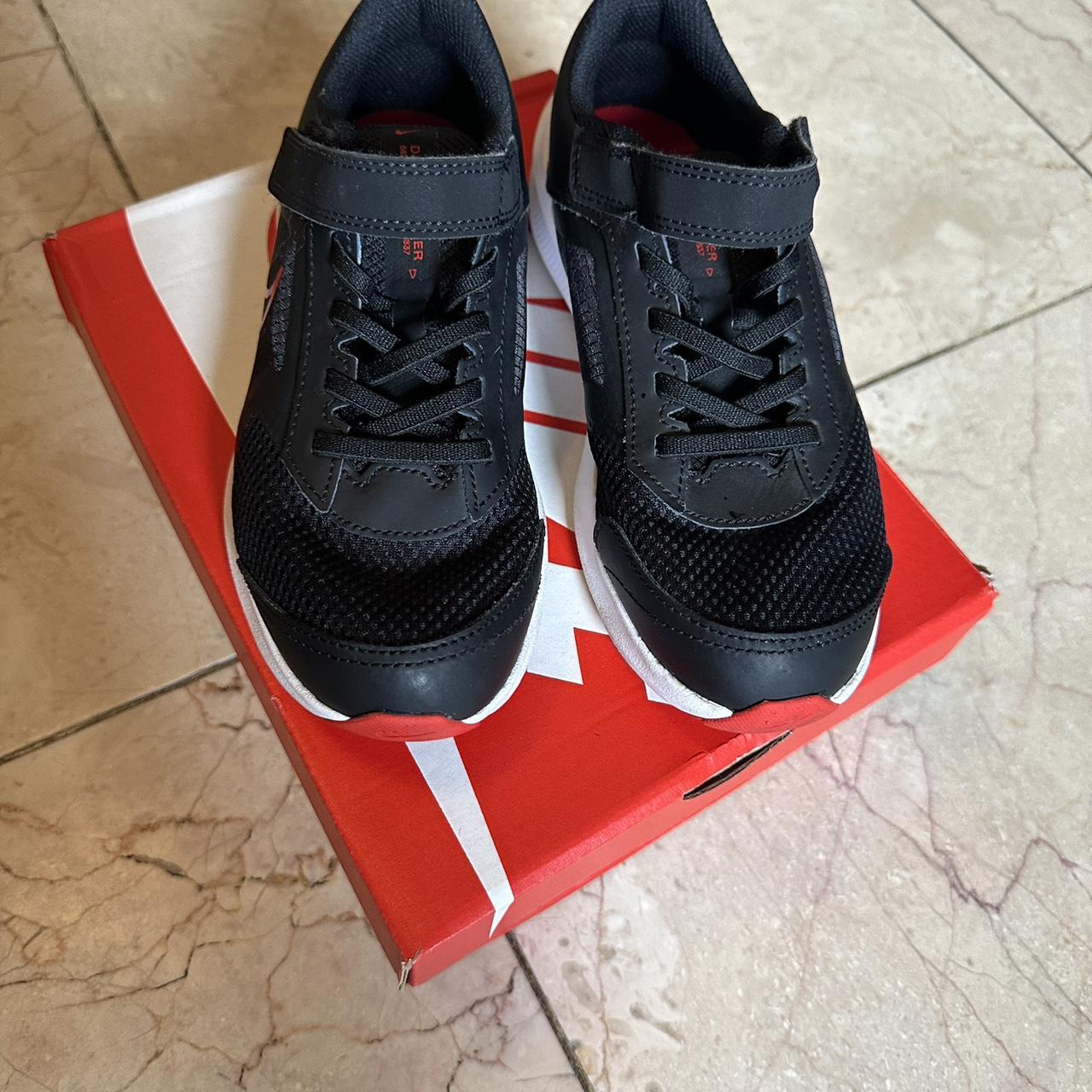 Kids black trainers size on sale 2