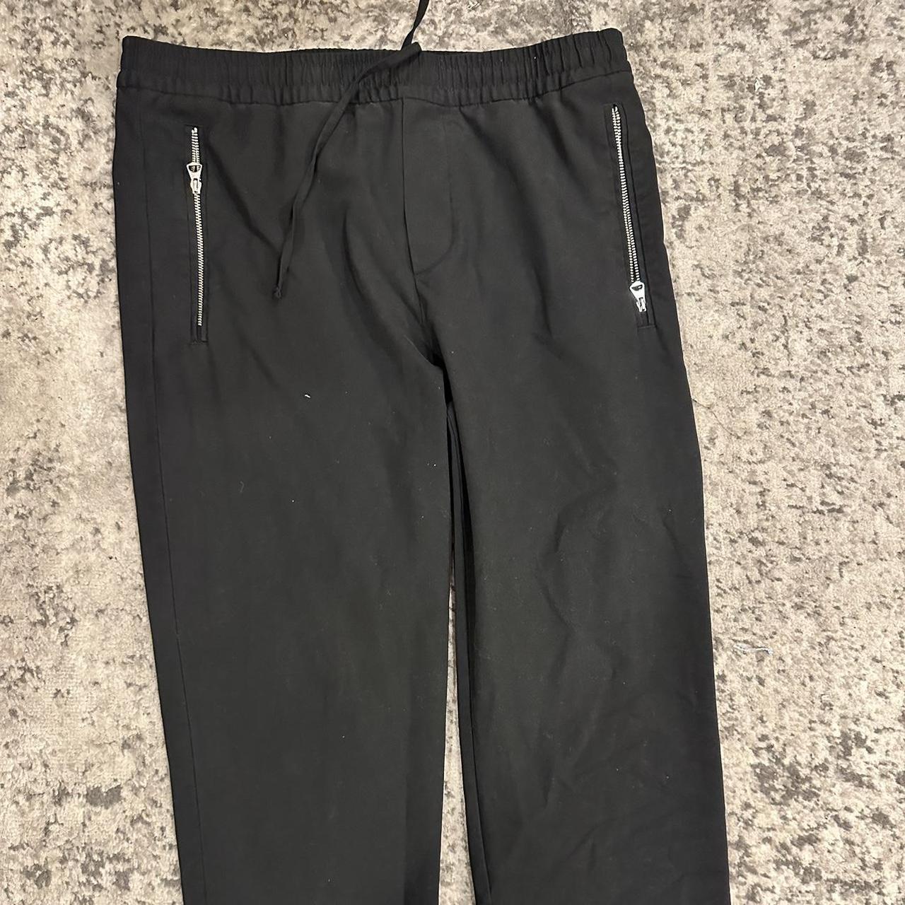 H and 2024 m black slacks