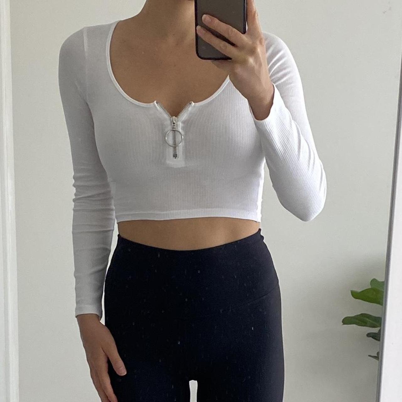 Long sleeve white crop top with front zip. Size XS... Depop
