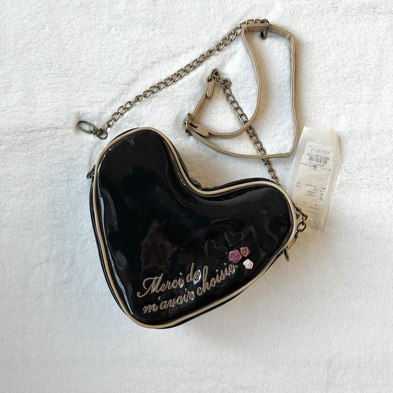 axes femme heart shaped bag new with tags dark... Depop