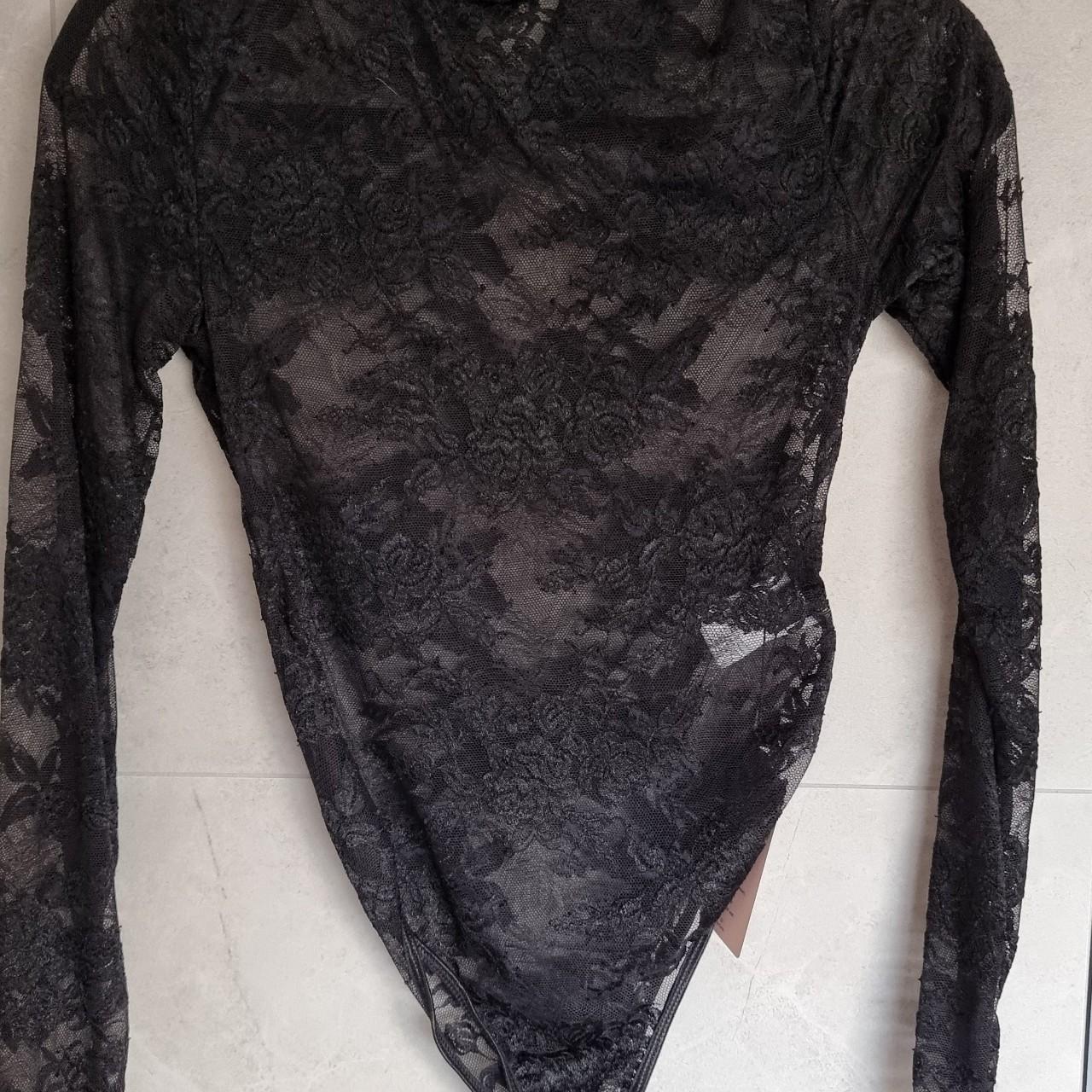 Black lace bodysuit BNWT. Size medium, I would say... - Depop