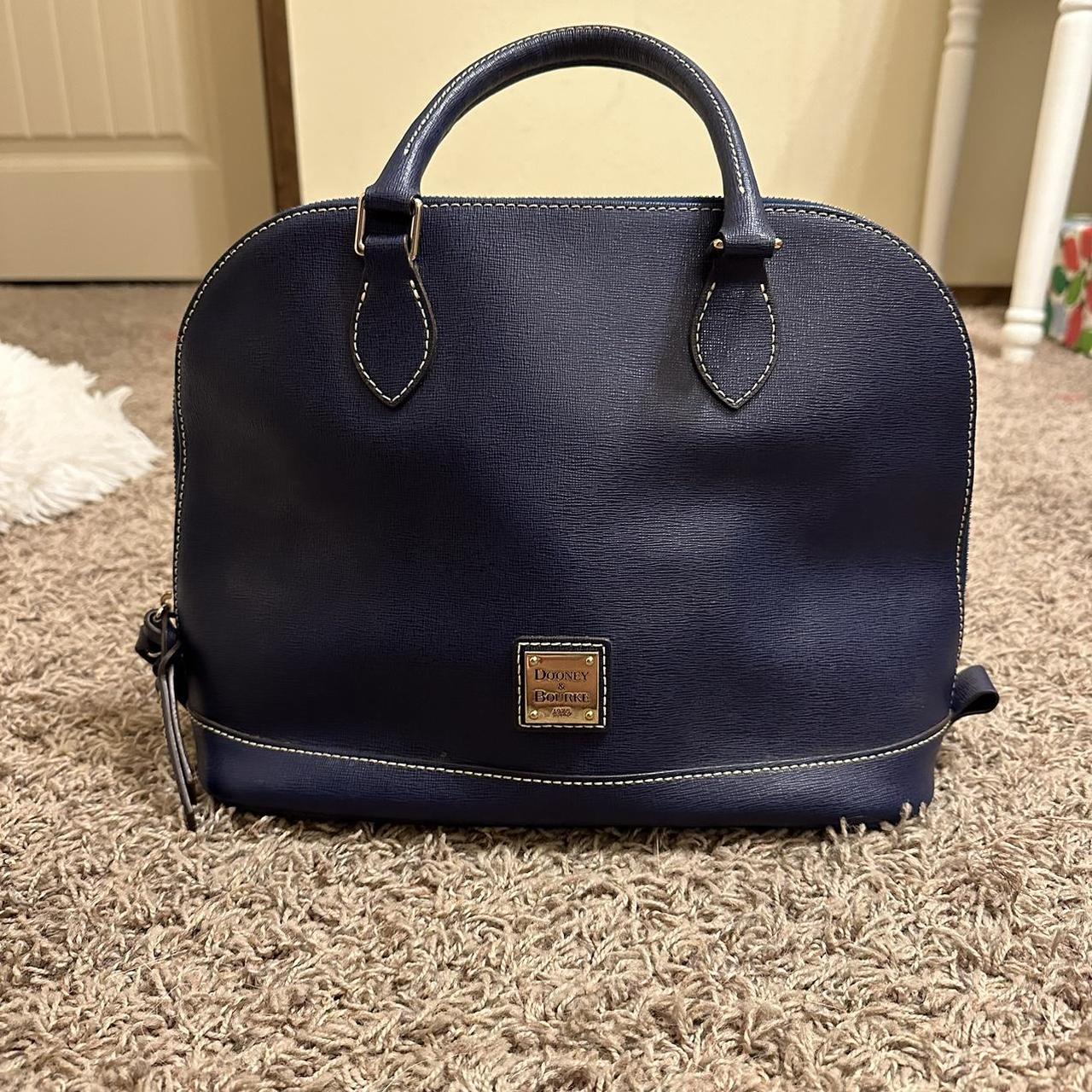 Navy blue Dooney Bourke purse has strap as well Depop