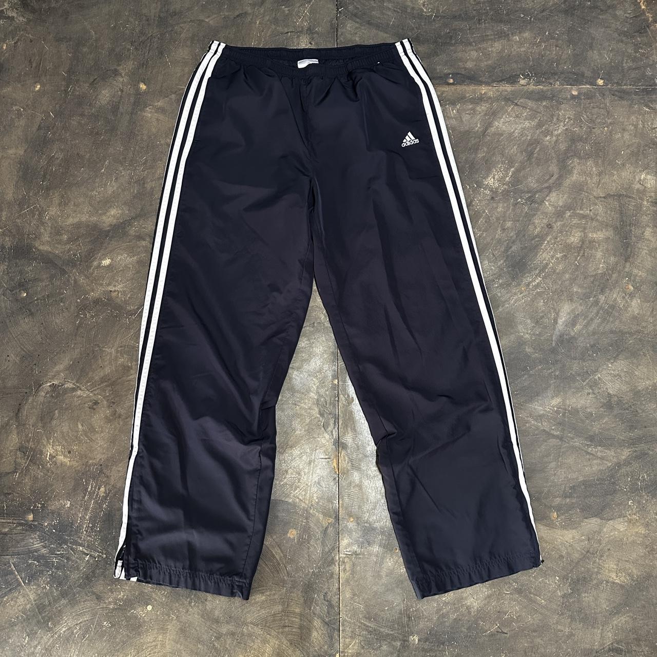 dark blue adidas sweatpants very small spot on back... - Depop