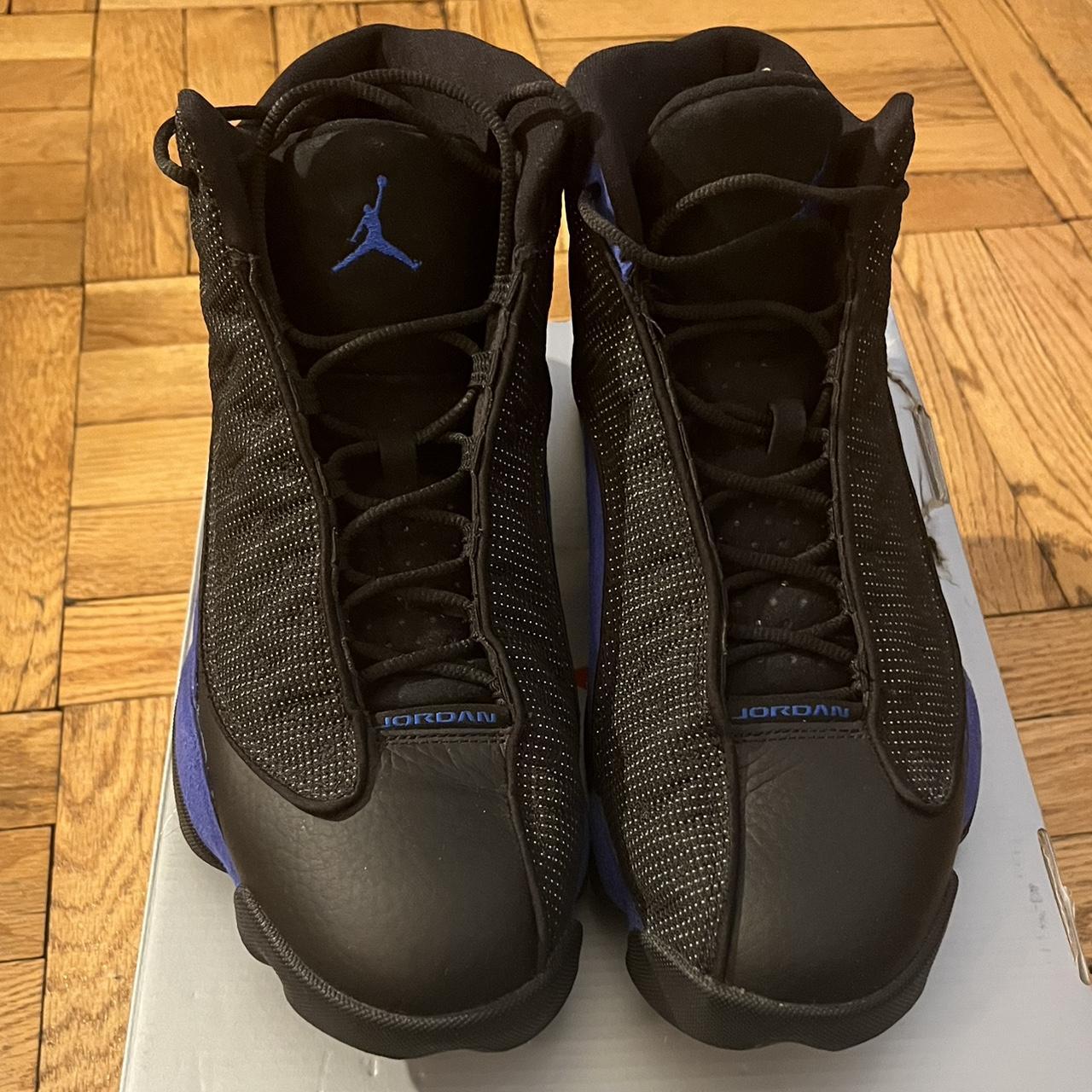 jordan blue and black shoes