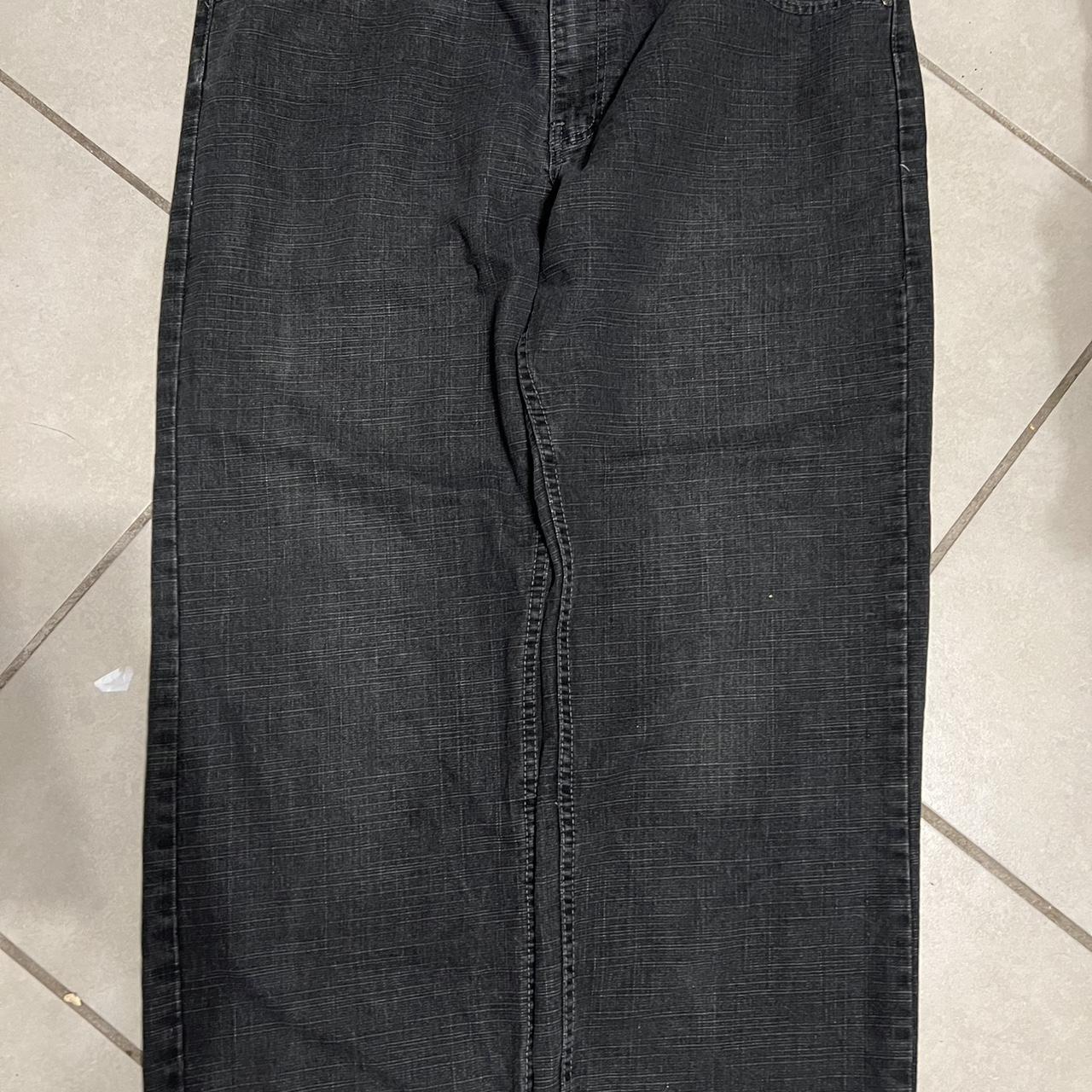 a faded black pair of pants - Depop