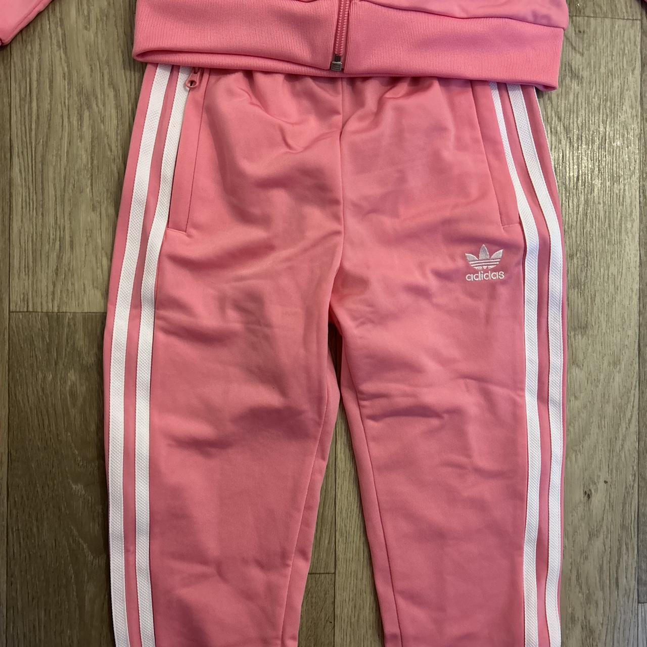 Pink adidas tracksuit 67 years Never worn just... Depop