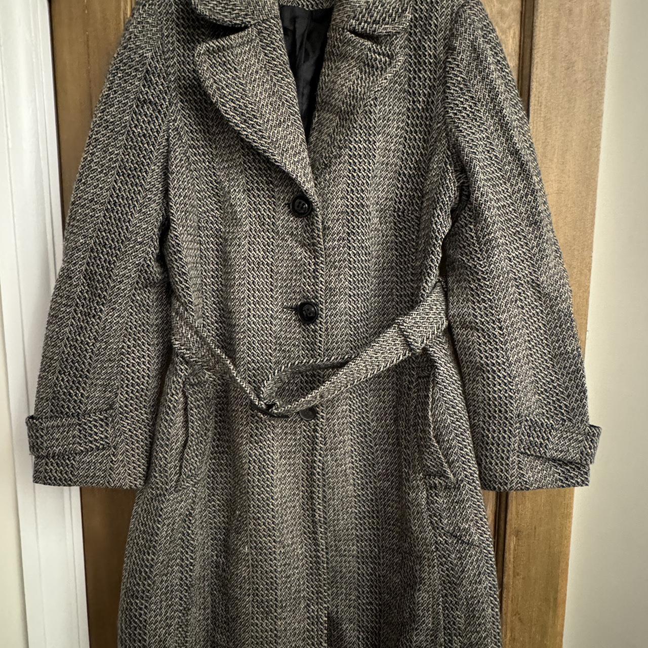 This classic black and grey overcoat by F F is