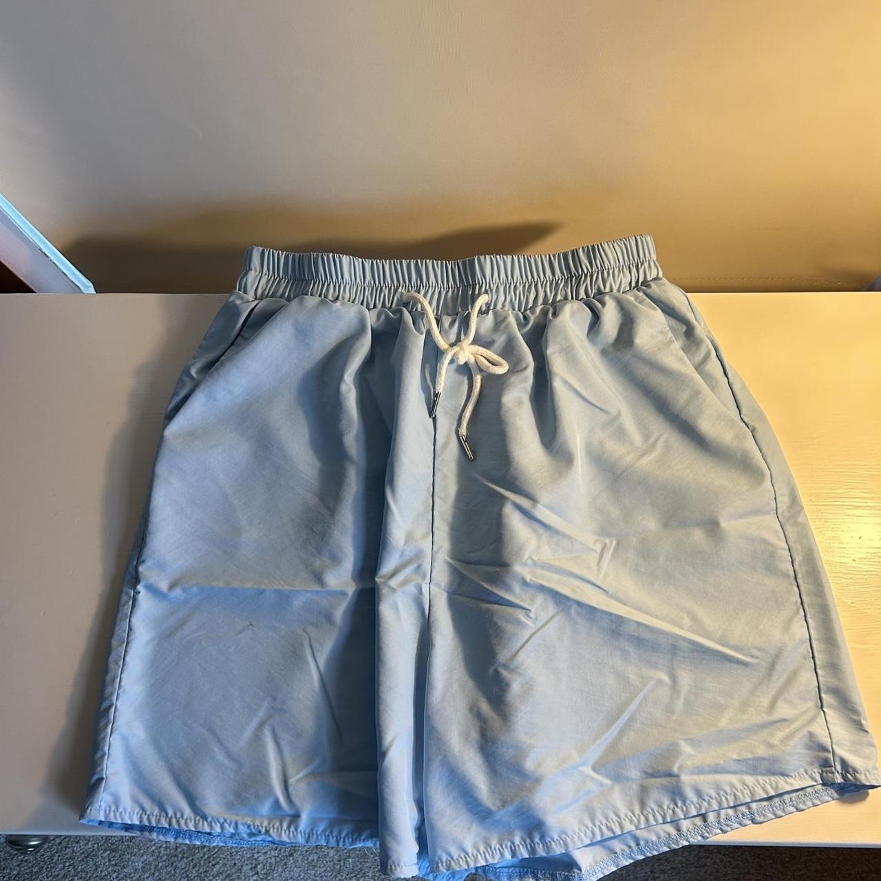 Men’s medium light blue ROMWE 7 inch nylon shorts - Depop