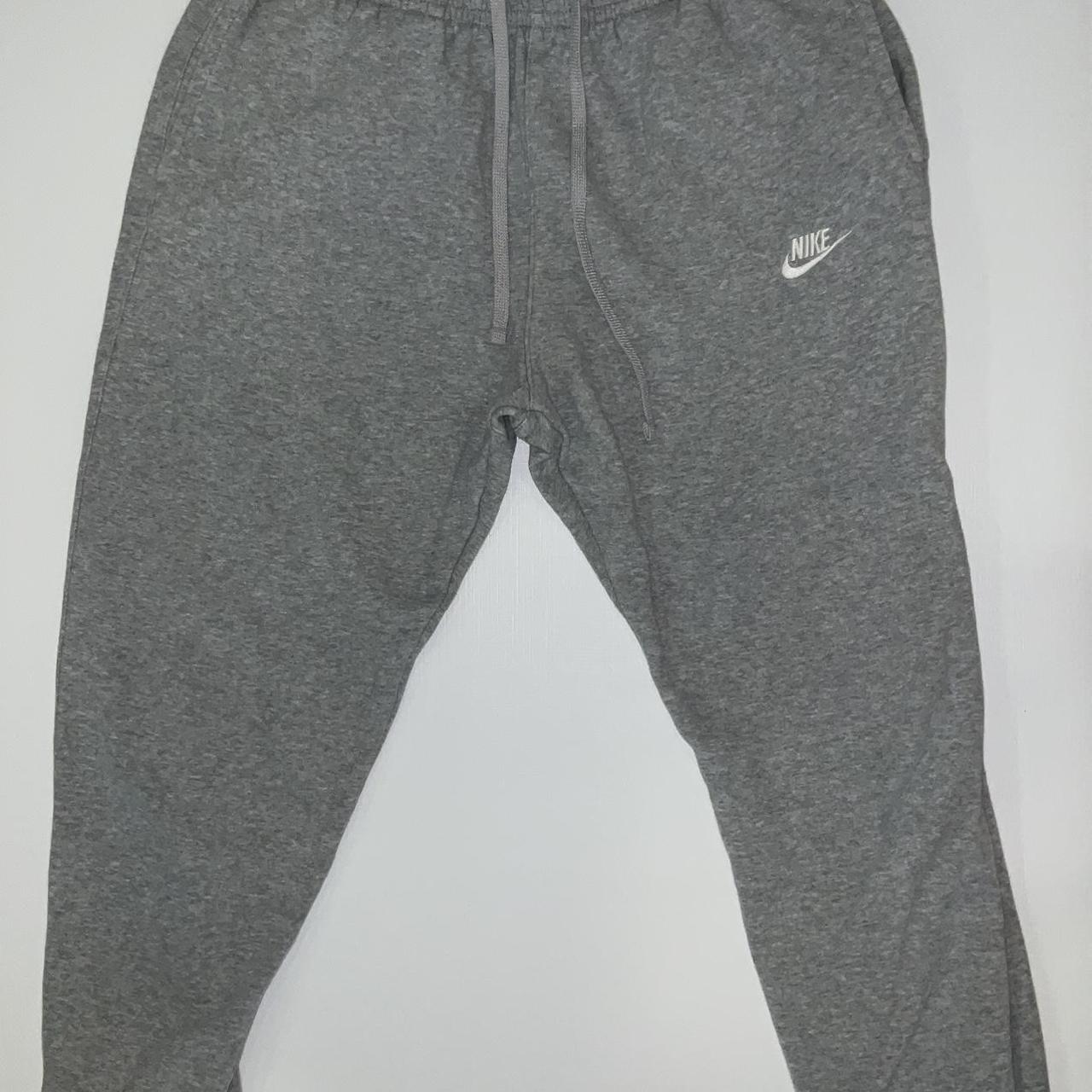 Large Nike grey sweatpants. - Depop