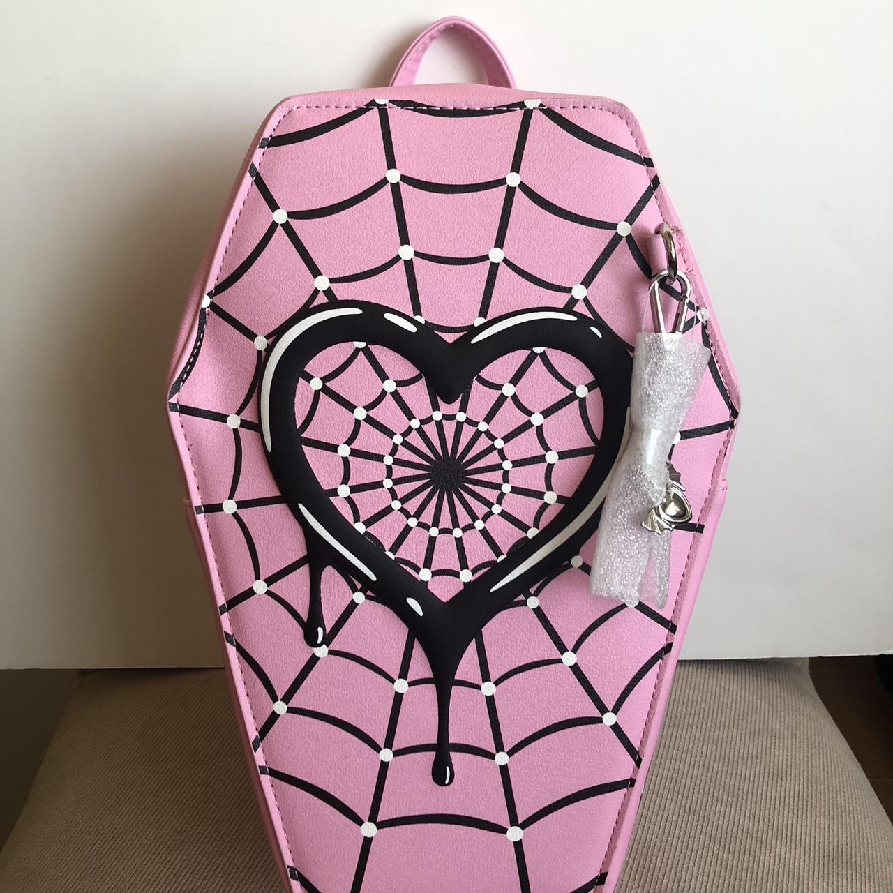 Pink coffin 2025 bag hot topic