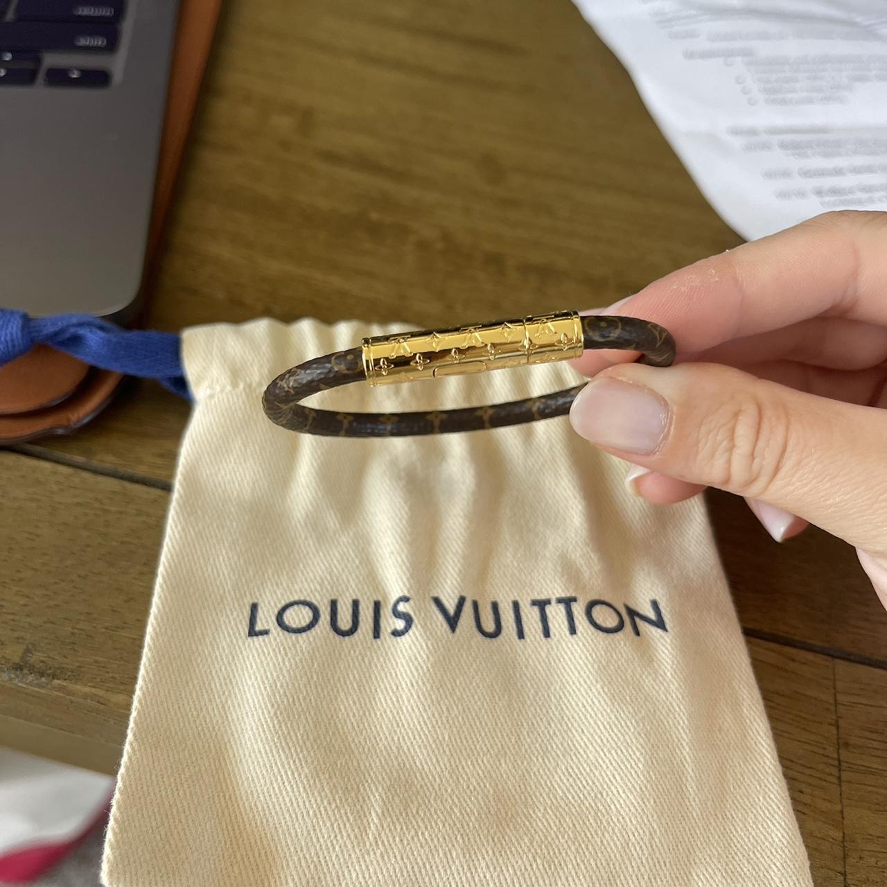 Louis Vuitton Logo Monogram leather/calf skin clasp... - Depop
