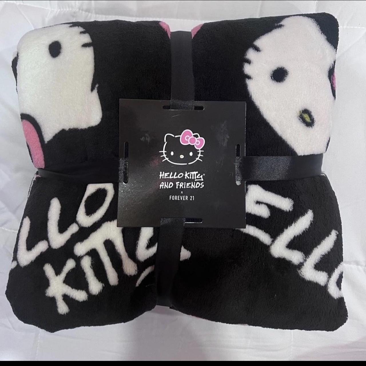 Hello Kitty black waterproof vinyl wraparound - Depop