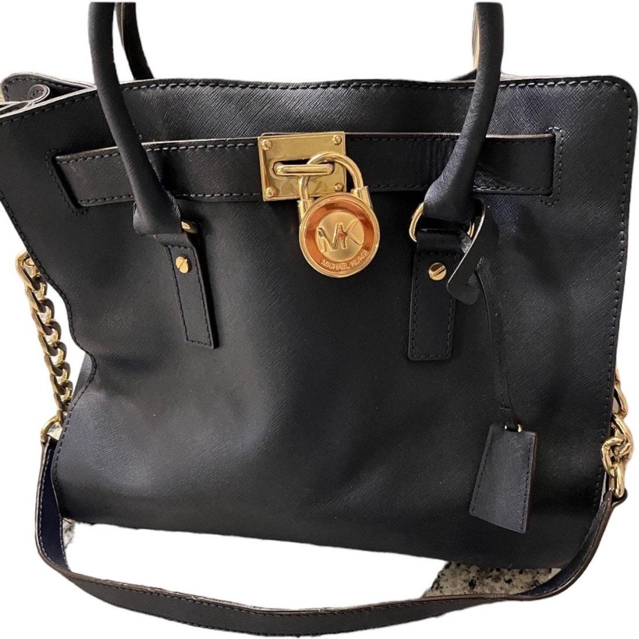 Black michael kors purse with gold chain fashion