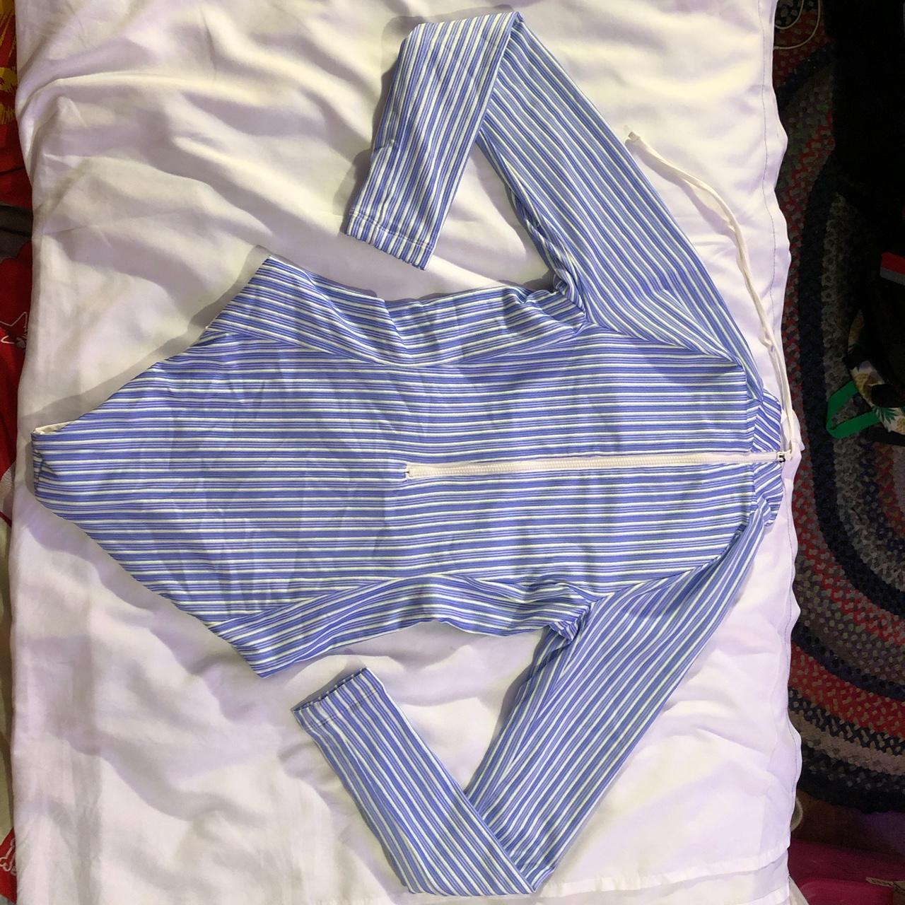 blue and yellow striped Hurley one piece long sleeve... Depop