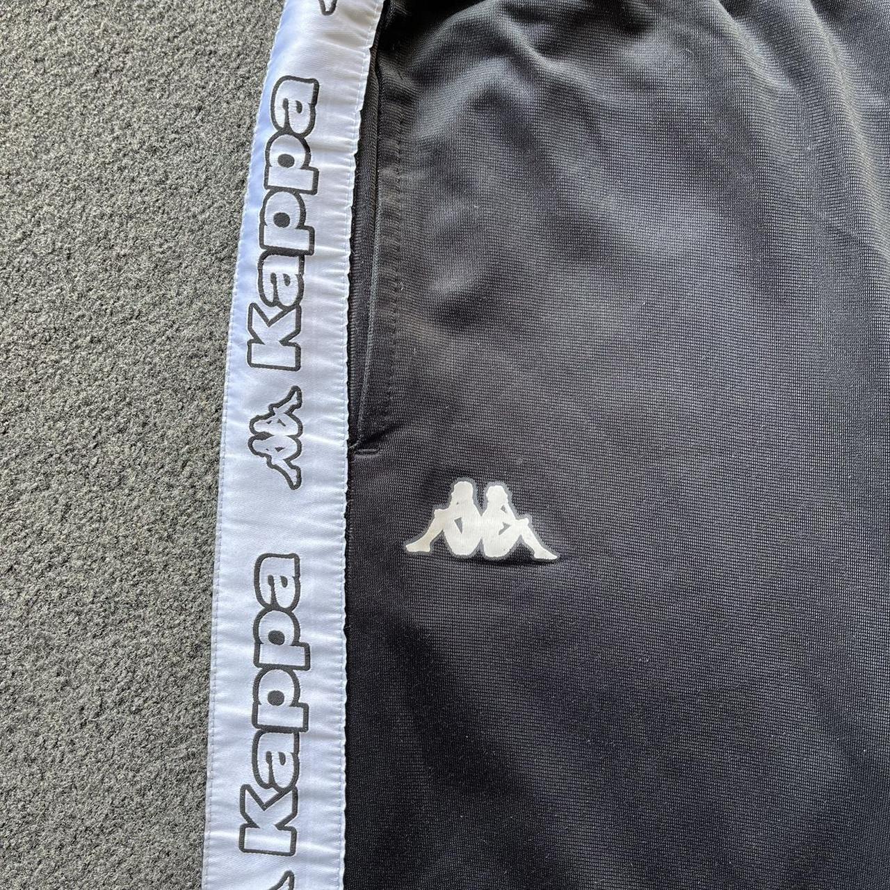 Black Kappa tracksuit pants medium. Small mark... Depop