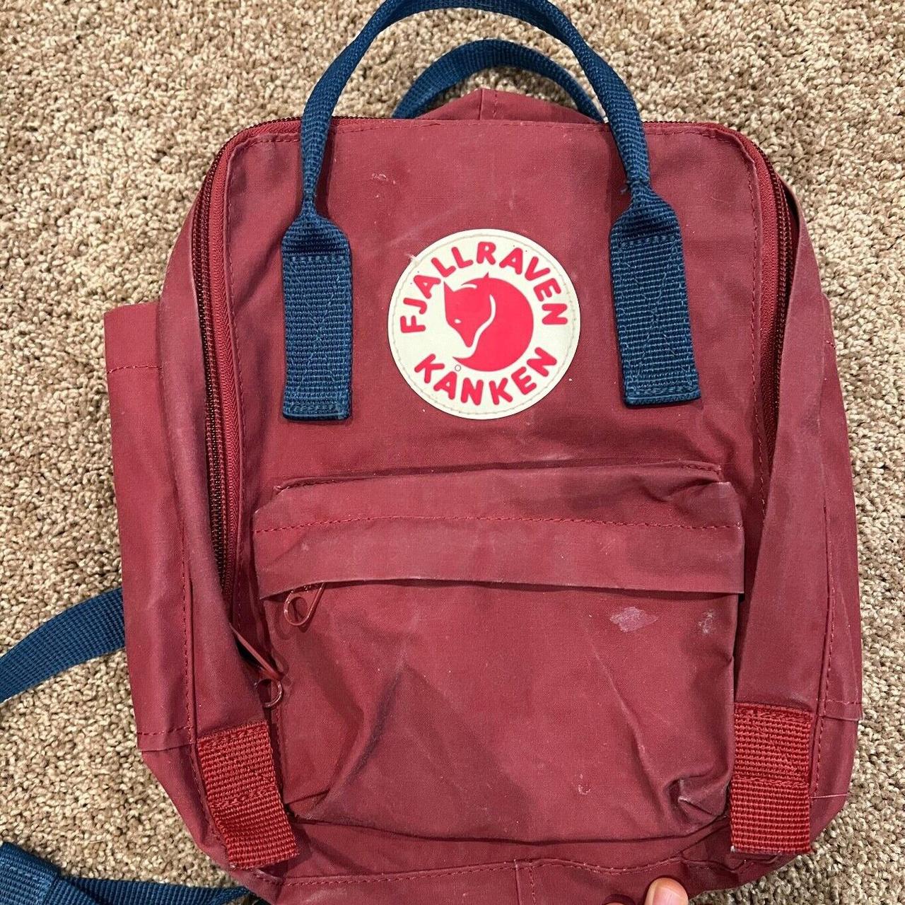 Kanken Mini in Ox Red with Royal Blue accents In