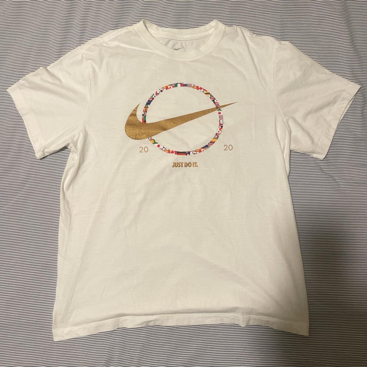 Nike Men's White T-shirt | Depop