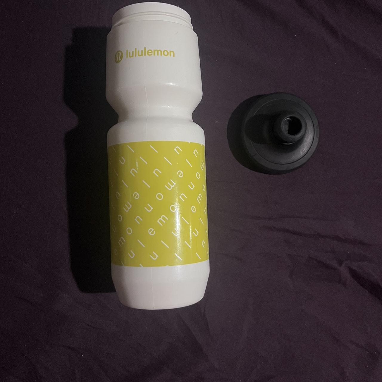 Lululemon water bottle. Pink with silver writing. - Depop