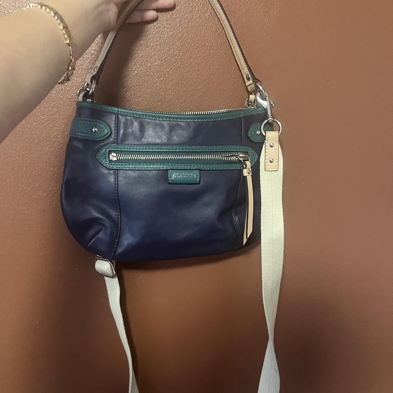 s blue green coach purse has detachable strap