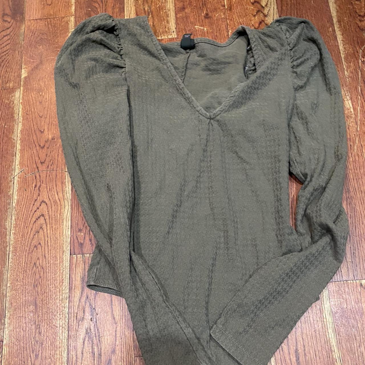 Green puffy shoulder bodysuit. Size Medium From Target Depop